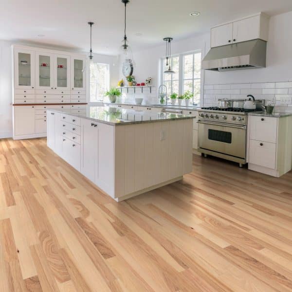 Room scene featuring 3" wide hickory engineered hardwood floor in a living room