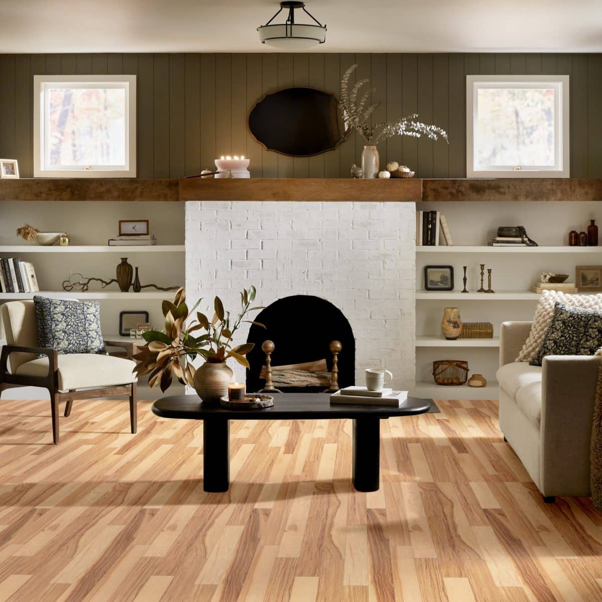 Room scene featuring 3" wide hickory engineered hardwood floor in a living room